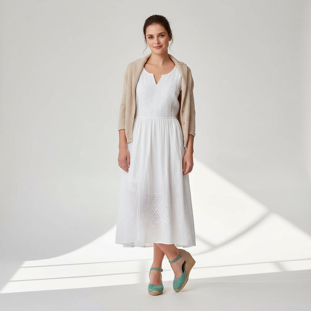 Model wearing mint suede MARIGOLD espadrilles with 7cm jute wedge designed for smaller feet.