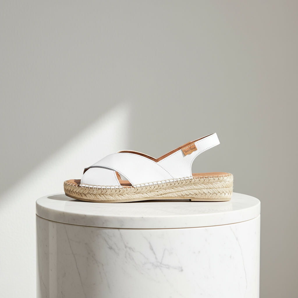 Side profile of white ALEXA espadrilles with jute platform for small feet