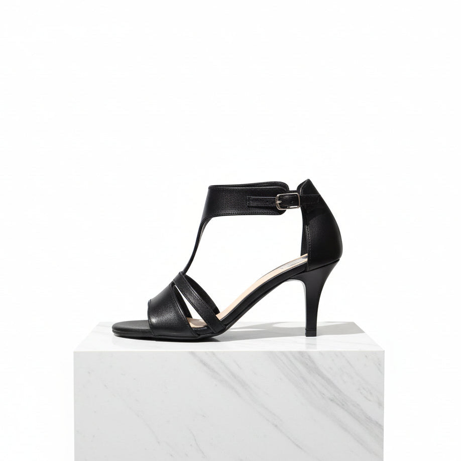 Black high-heeled sandal on a white background