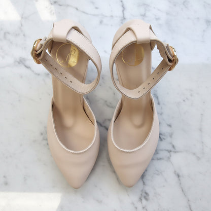 Pointed toe court shoes with an ankle strap in nude leather