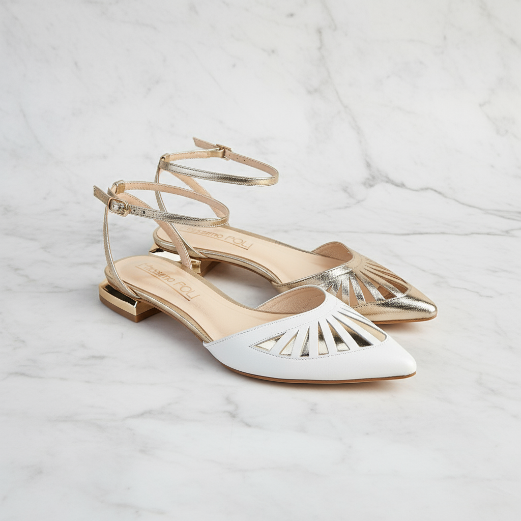 White and gold shoes on a marble background