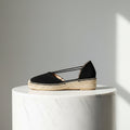 Side view of black suede espadrille with elastic straps and natural jute sole, crafted for small women's feet.