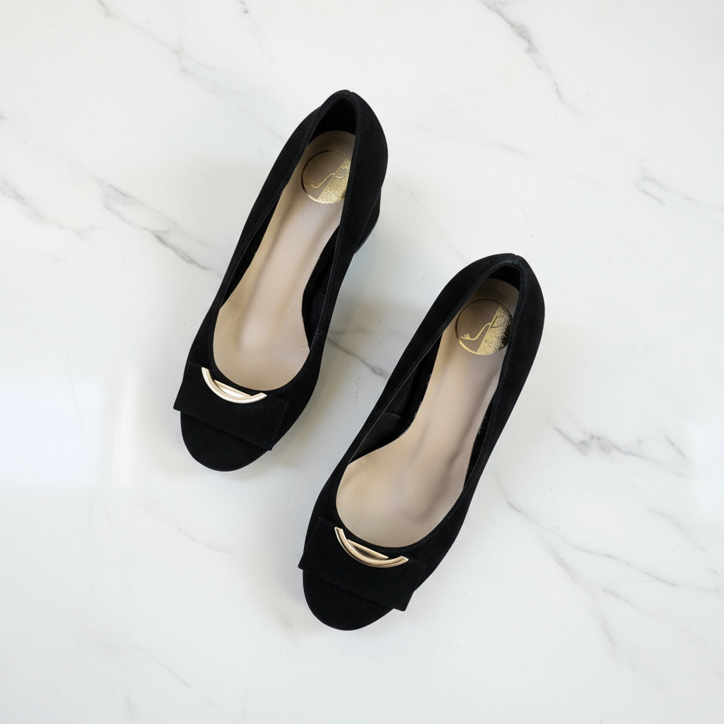 Top view of petite black suede block heel shoes with silver buckle detail and leather cushioned insole