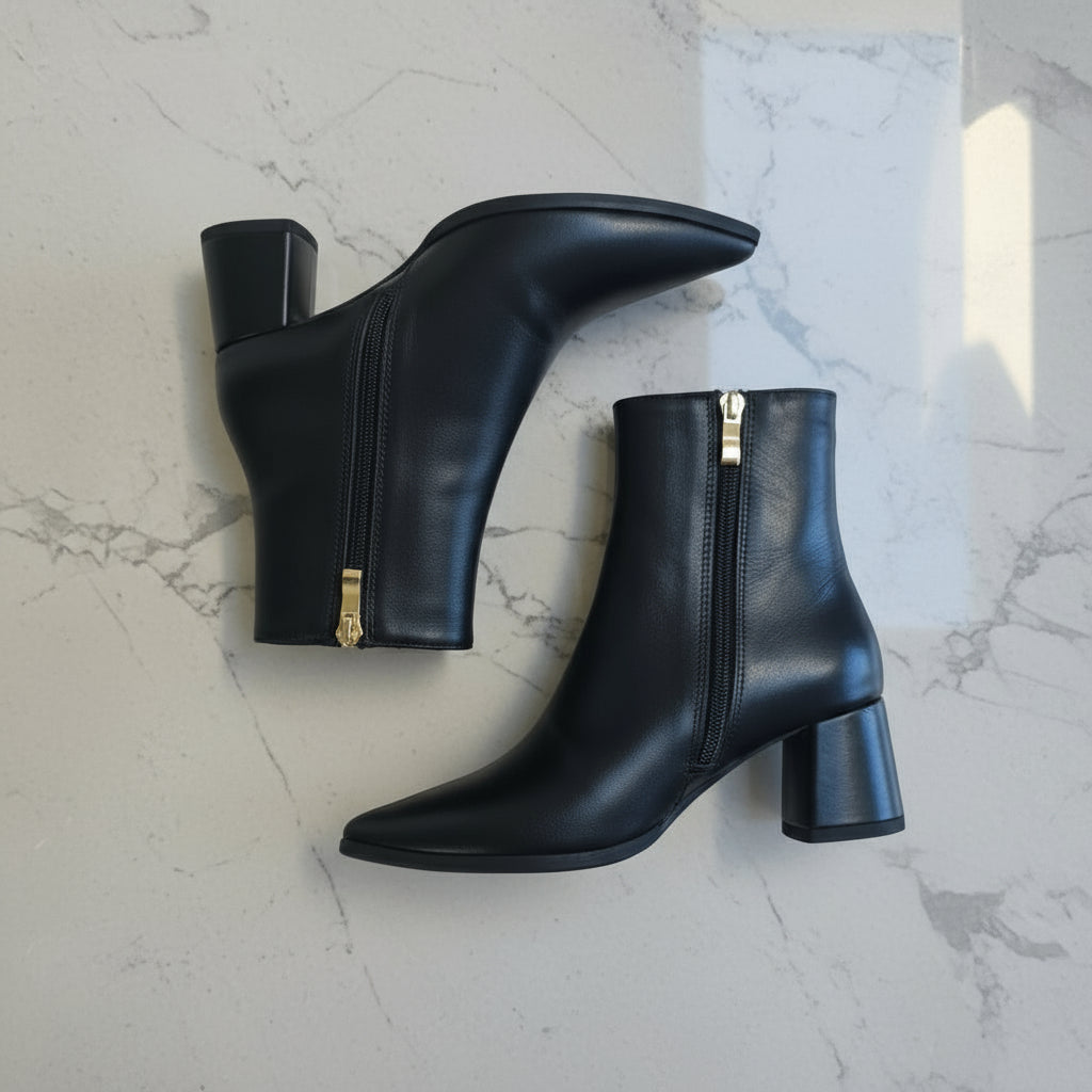 Side profile of CORA boot highlighting 6cm flared block heel and smooth leather upper.