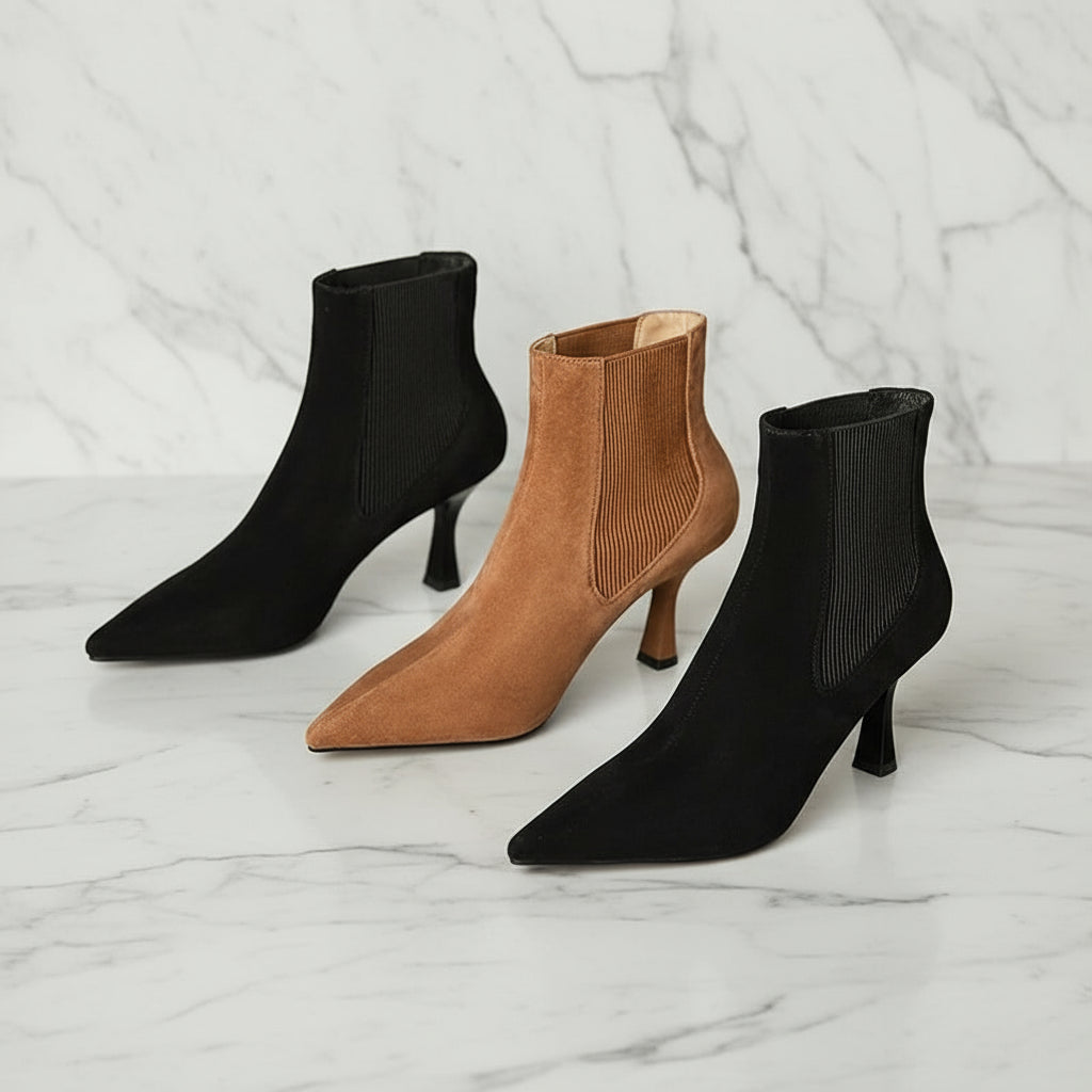 Pair of ELIANA ankle boots showing tan and black suede options with elastic gussets.