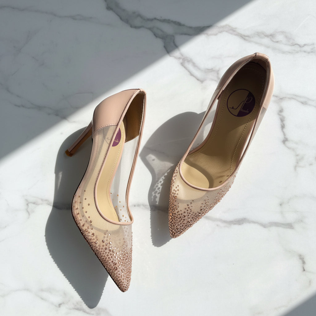 EMMA nude leather and mesh crystal heels, overhead pair view showing rose gold crystals.