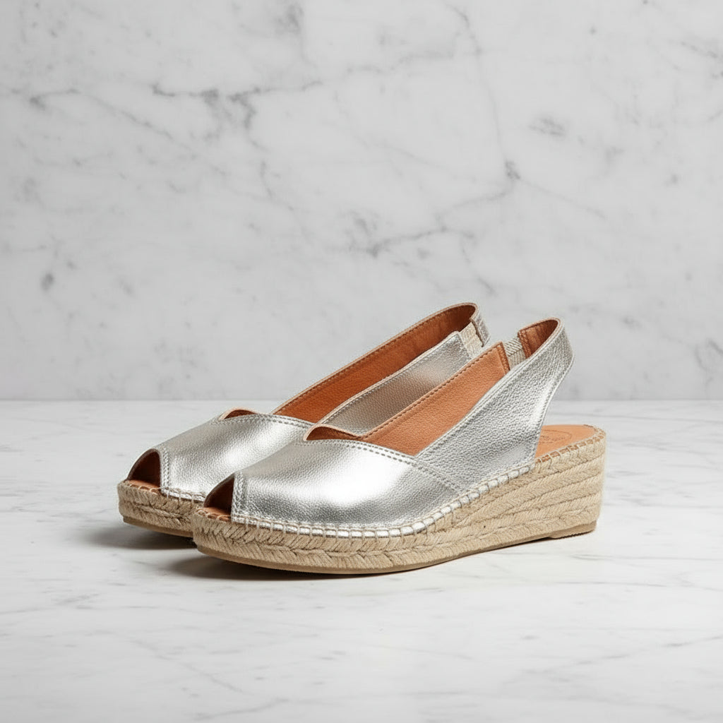 LEILA gold leather espadrille wedges in small sizes, featuring metallic finish and handcrafted jute platform for elegant height