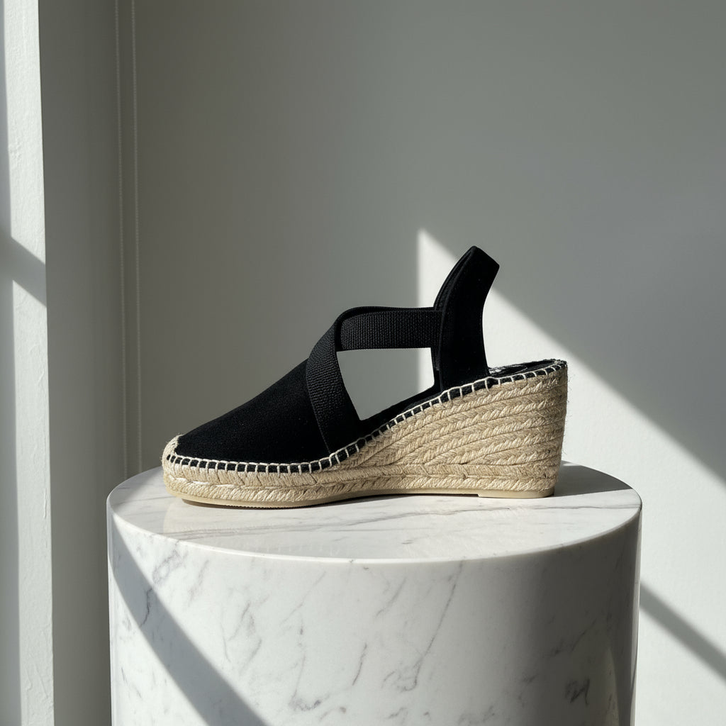 Black suede HAZEL espadrille wedges with elastic crossover straps and jute wedge heel, designed for petite women's feet.