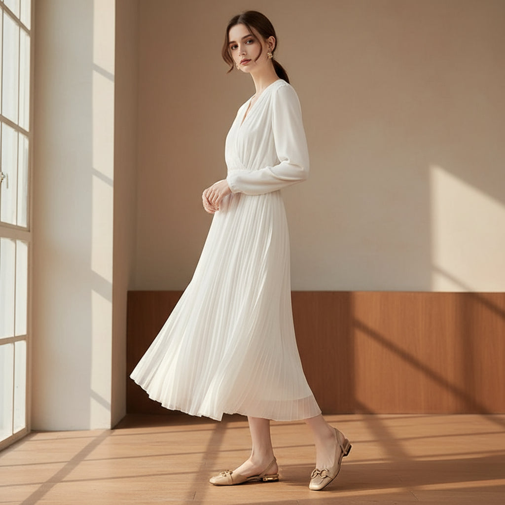 Beige leather slingbacks with elasticated heel strap and antique gold brooch worn on petite feet