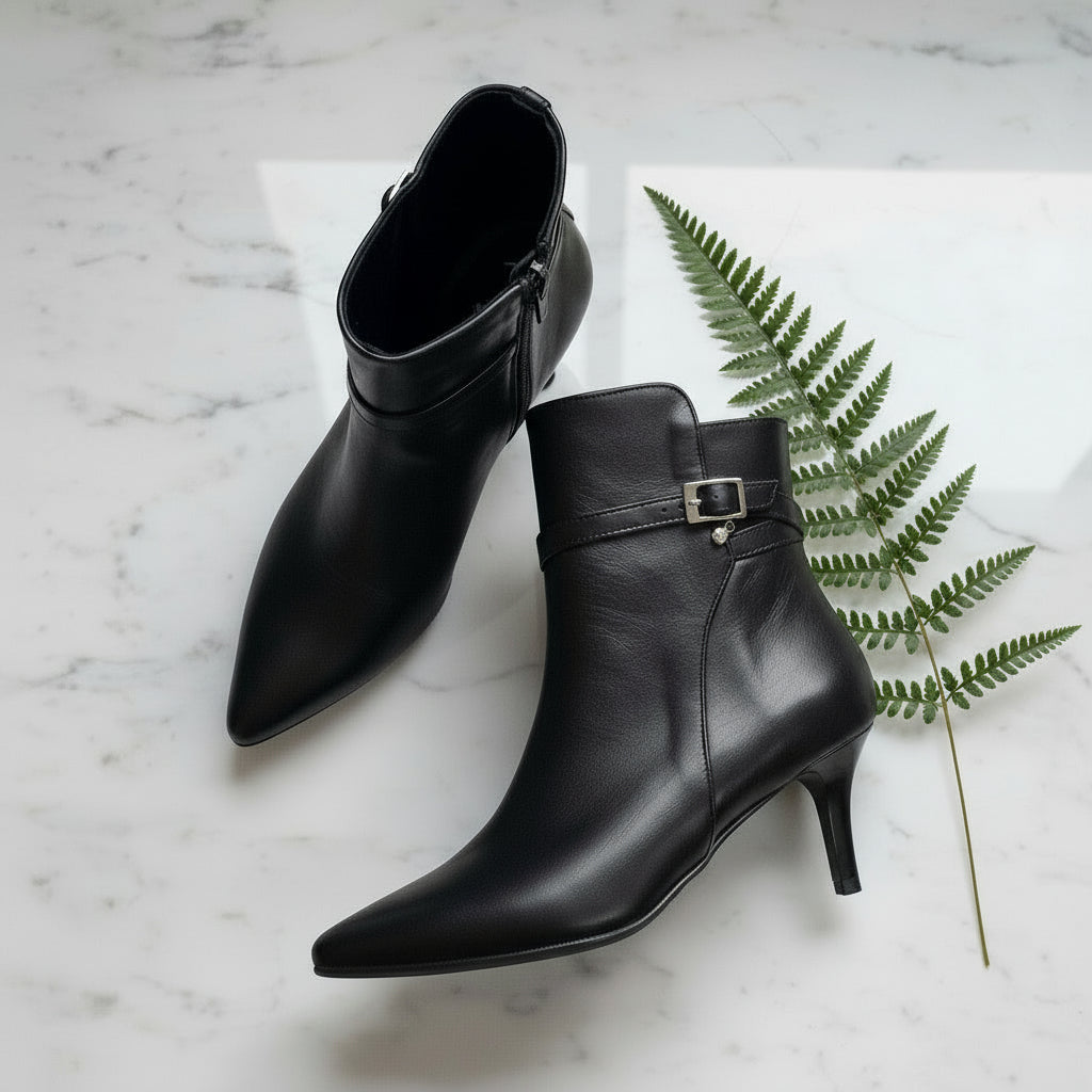 Pointed toe black leather, kitten heel, small size ankle boots.
