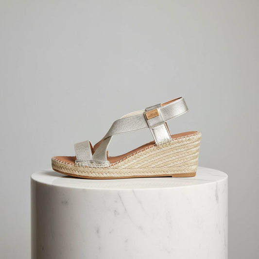 Side profile of LINA gold metallic wedge sandals with crossover straps and jute espadrille wedge, perfect for small size feet.