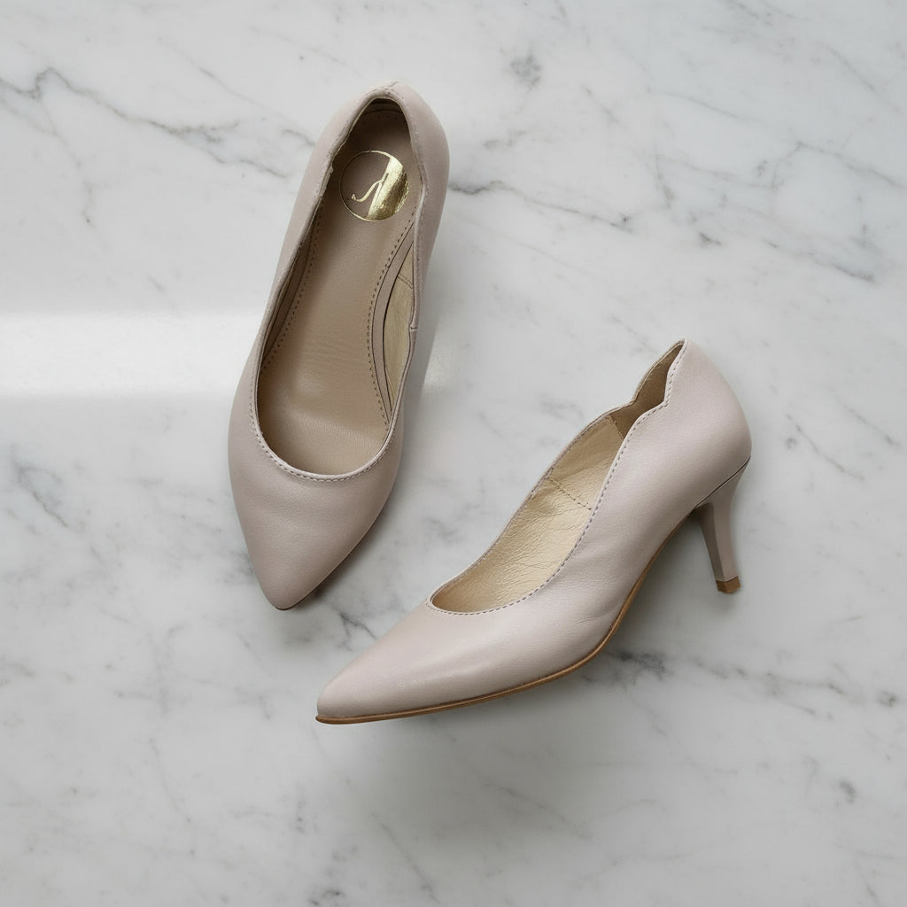 Side view of LUNA nude matte leather kitten heel court shoes with 6cm heel and ankle cut-out detail