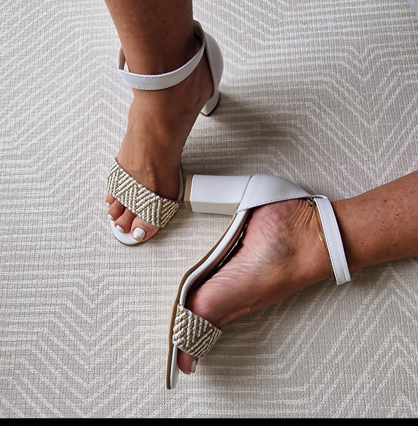 White leather ankle strap sandal set on a block heel