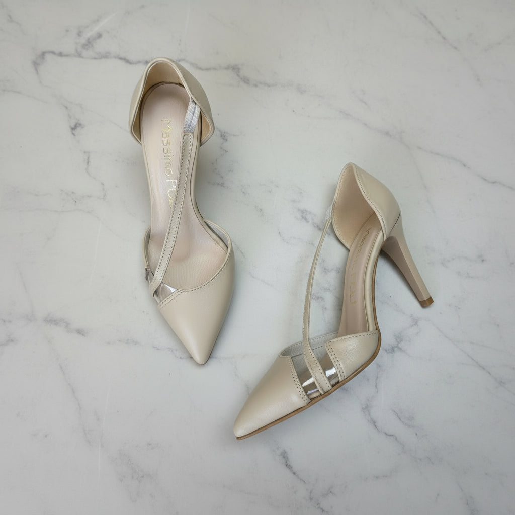 Elegant ORA nude leather 9cm heels with translucent panels and pointed toe design on marble backdrop