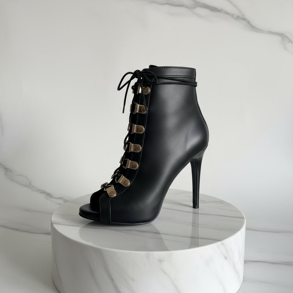 Petite black leather boots with open toe and lace front fastening.