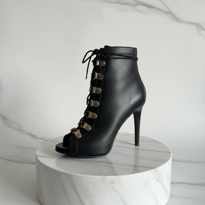 Petite black leather boots with open toe and lace front fastening.