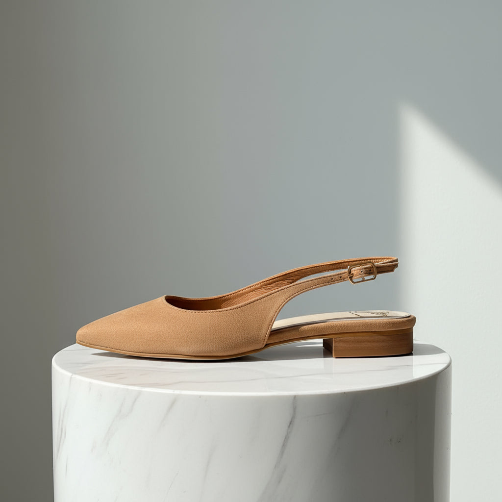 Small size poised toe tan suede slingbacks.