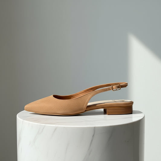 Small size poised toe tan suede slingbacks.