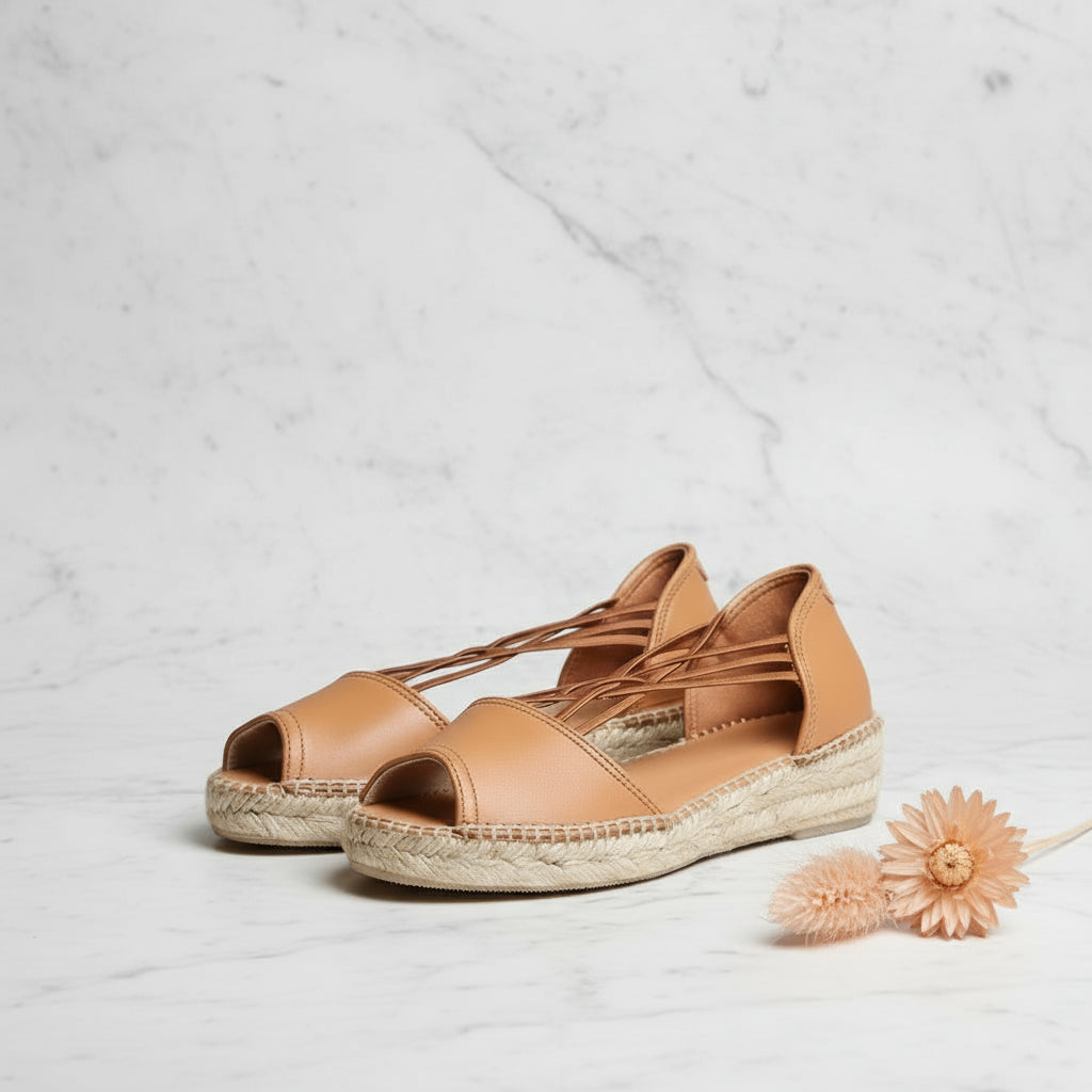 Tan leather peep-toe espadrilles with crisscross elastic straps and jute rope sole, designed for petite feet sizes 1-2.