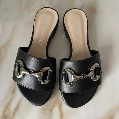 Black leather petite slip on sandals with a silver buckle