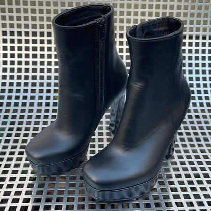 4 inch high heel platform boots in black leather
