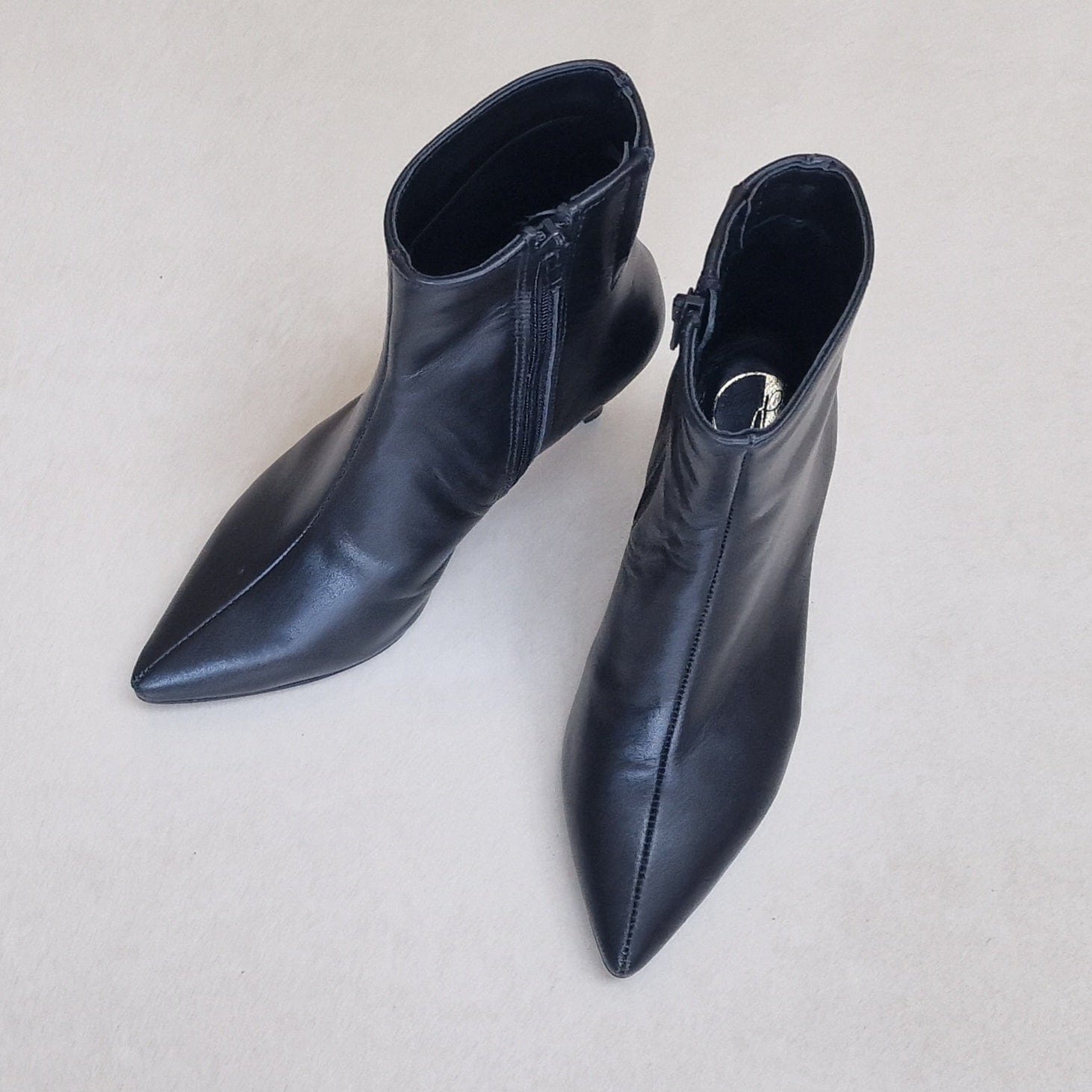 Pointed toe black leather kitten heel ankle boots