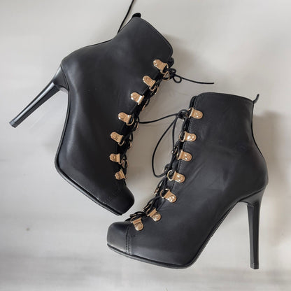 Black leather lace up gladiator style high heel boots