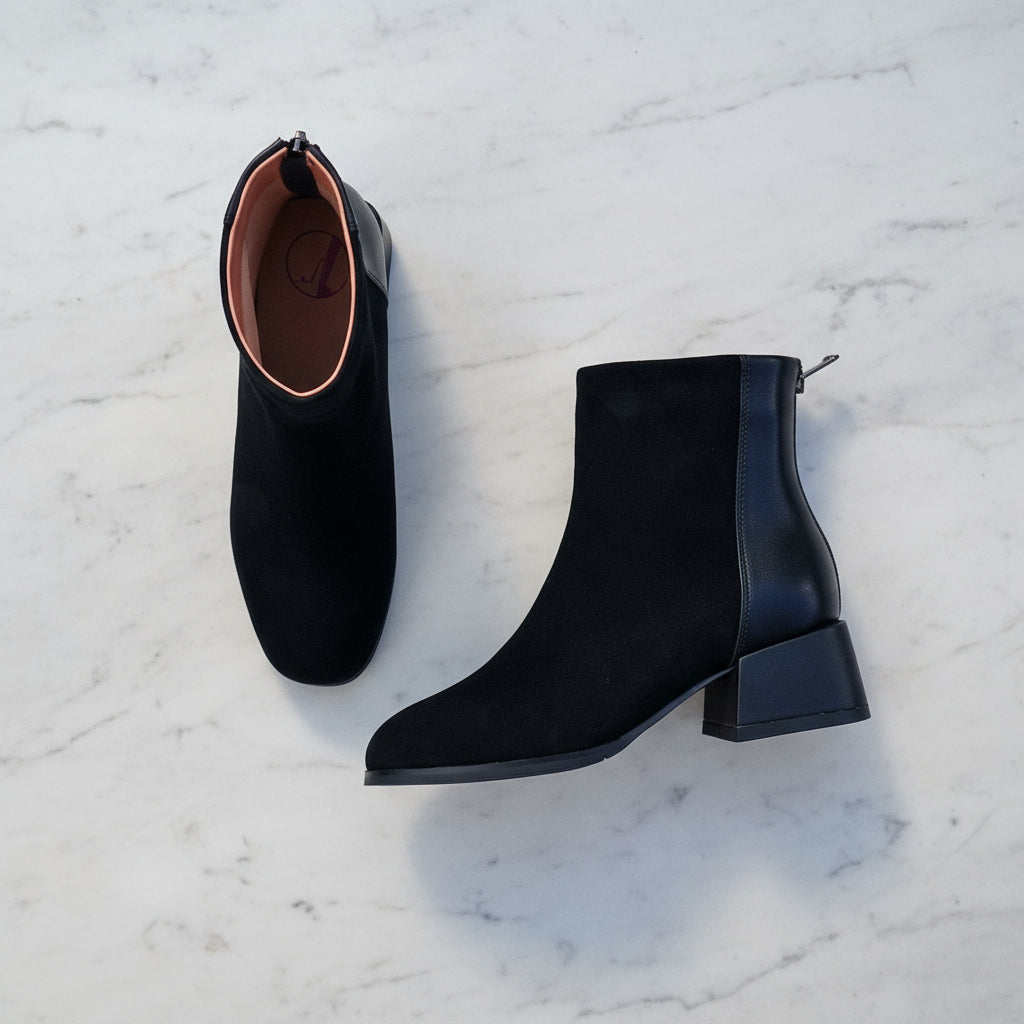 Petite black leather ankle boots with block heel and zip at the back