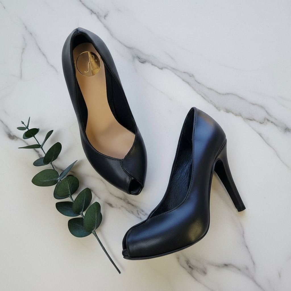 Black leather peep toe court heels with a hidden platform