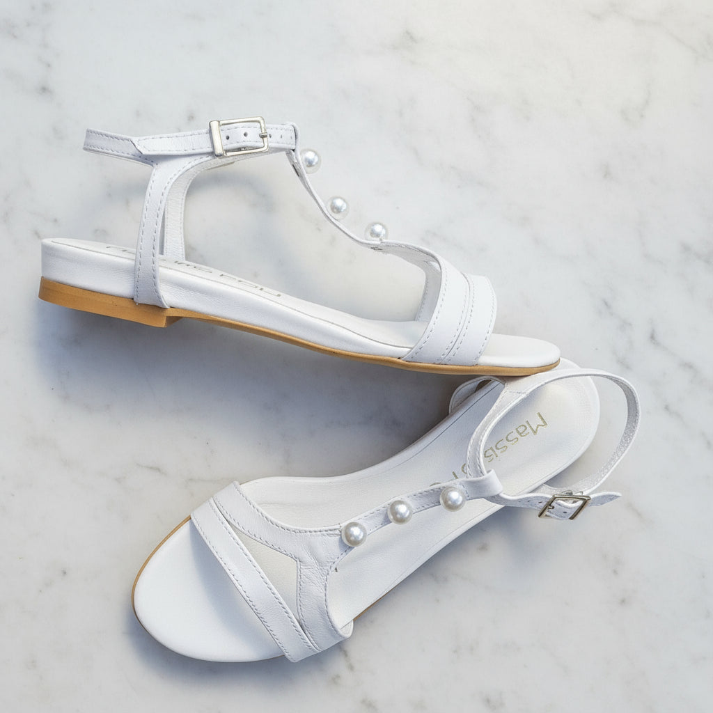 SANTI white genuine leather sandals with pearl T-strap against blue sky, 2cm heel for petite women