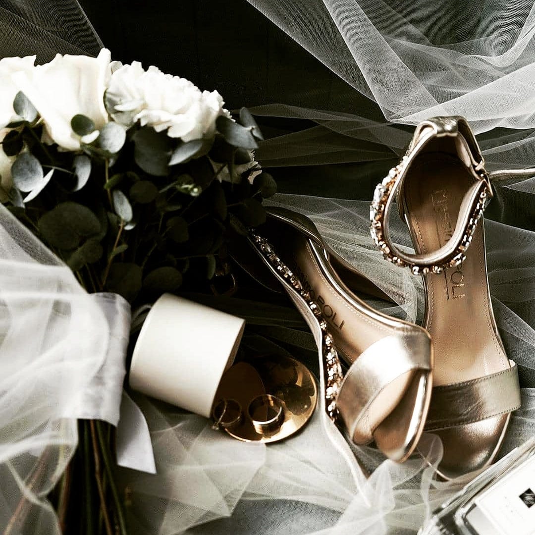 STAR gold metallic leather heels with crystal detail displayed with wedding accessories, perfect for petite brides 