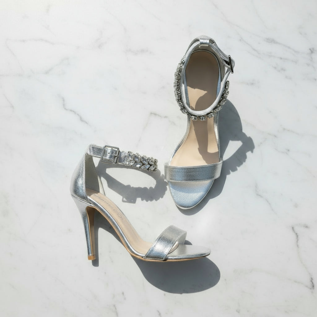 Close-up of STAR silver leather heels with crystal embellishments, luxurious petite footwear for special events