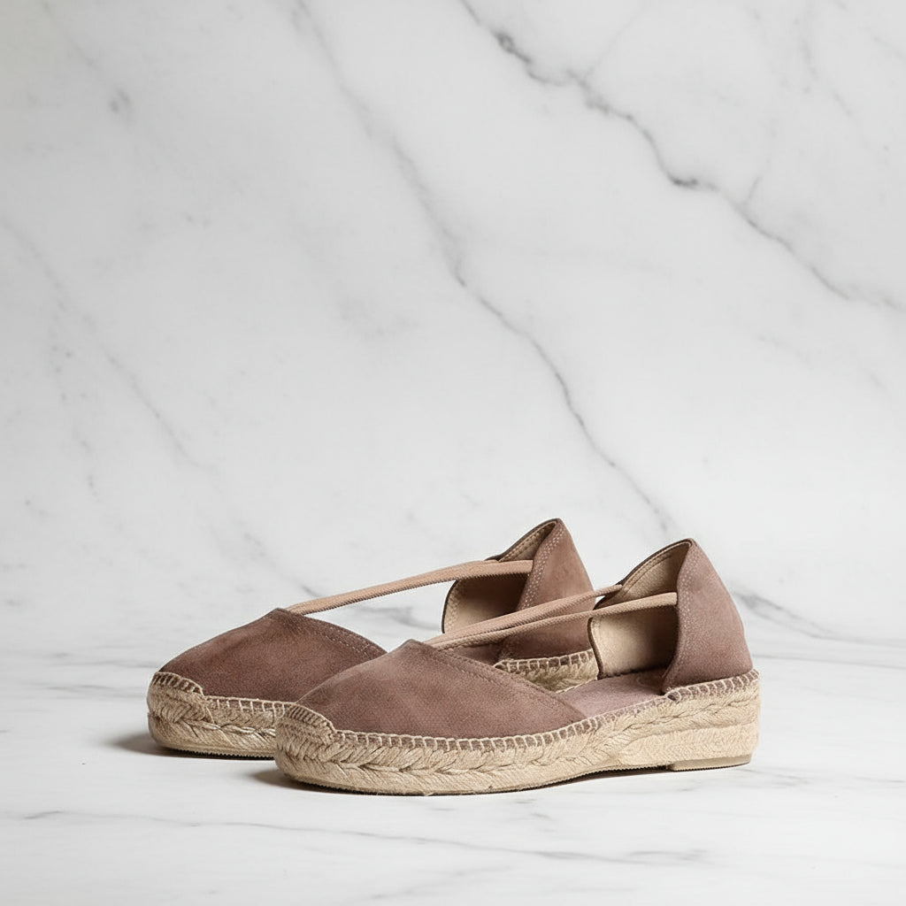 Front view of taupe suede espadrilles with elastic straps and jute sole in small women's sizes.