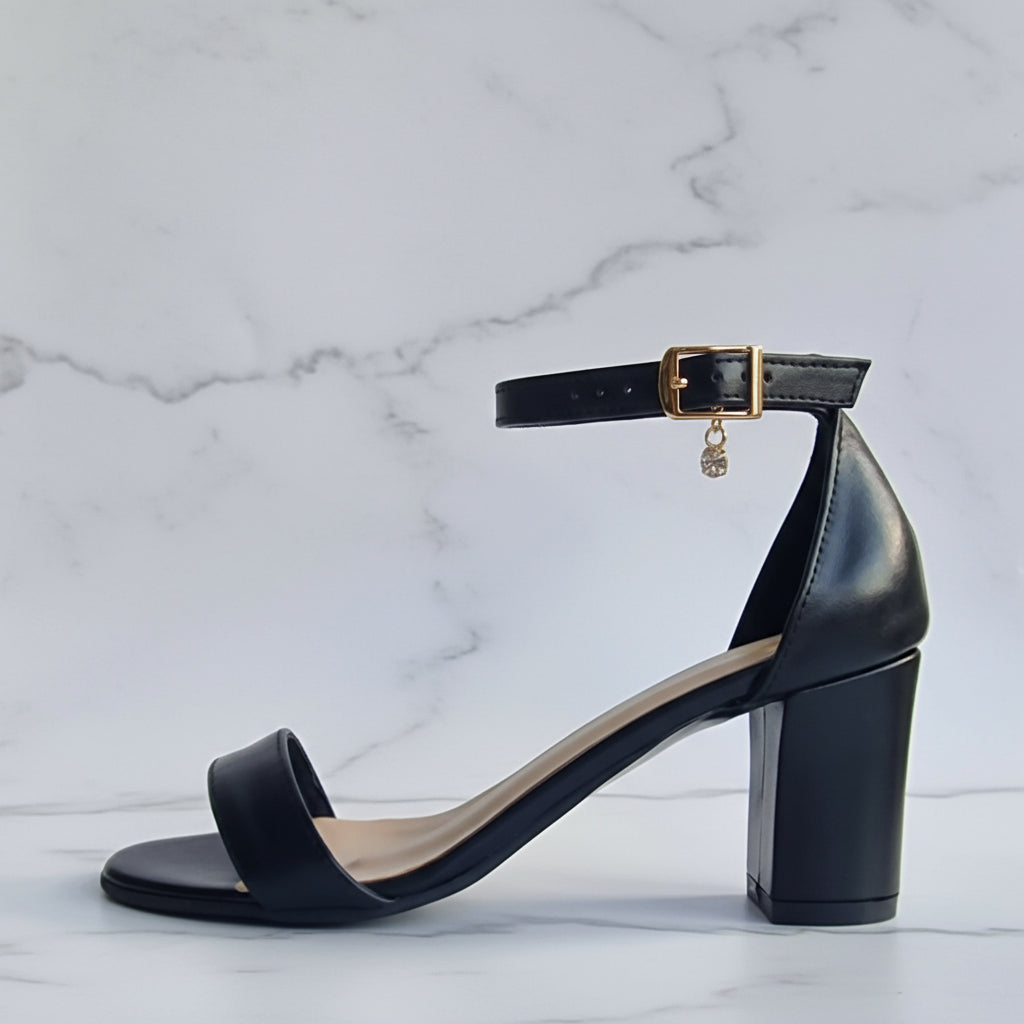 TRINITY black leather 7cm block heels with gold buckle ankle strap, classic sandals for petite sizes on marble counter