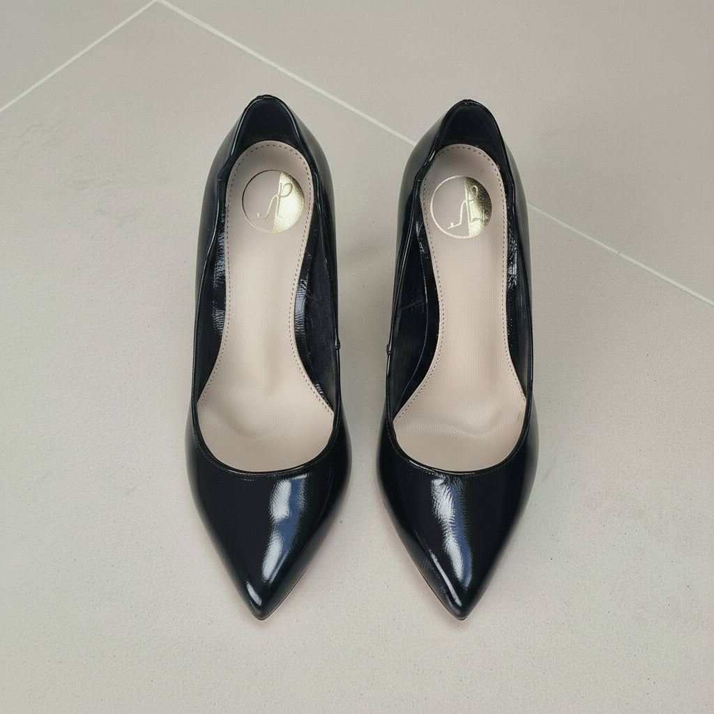 Top view of VOID black patent pumps for petite feet with cushioned leather insoles.