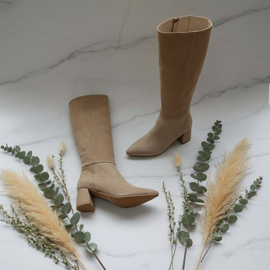 WINTER beige suede petite knee boots with 6cm heel, flat lay on marble.