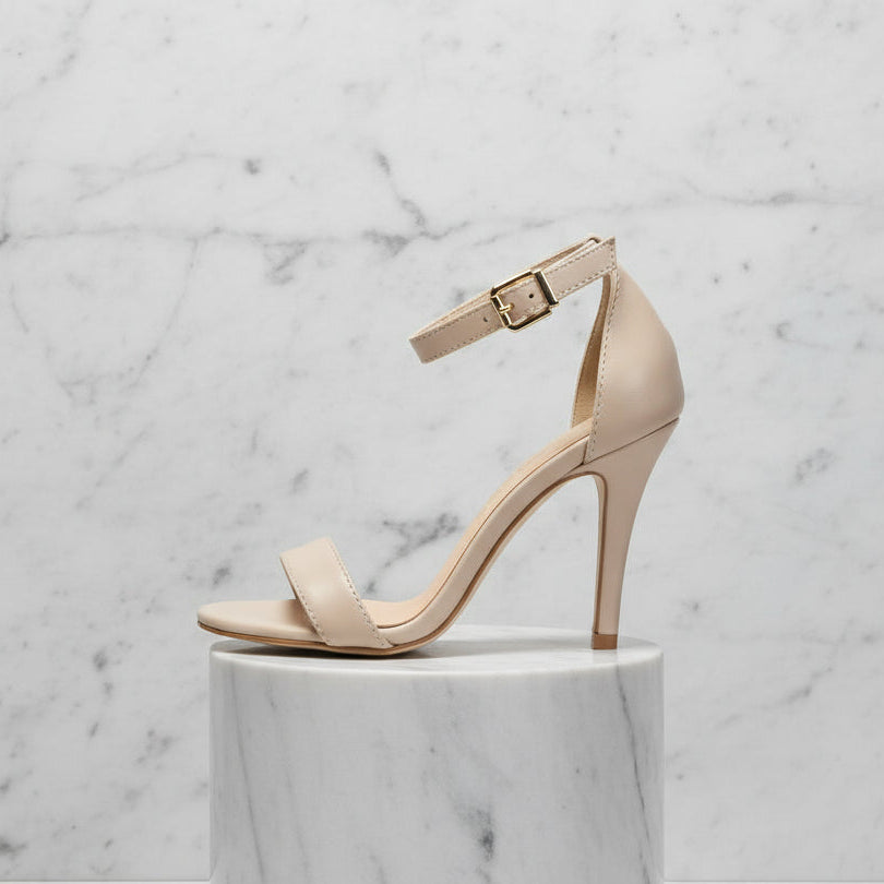 MARIS nude leather petite sandals on marble blocks showing ankle strap and cushioned insole