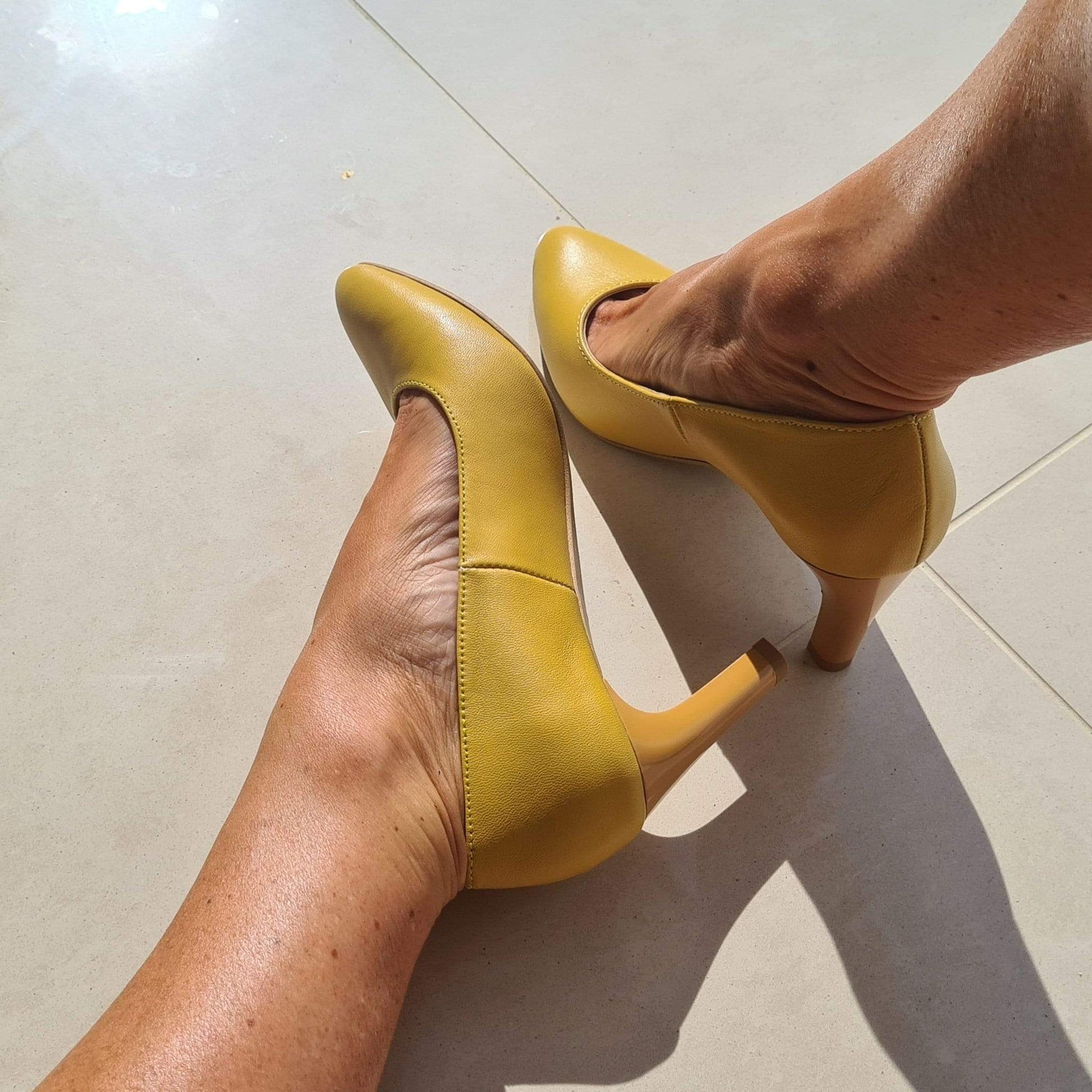Yellow leather cour heels