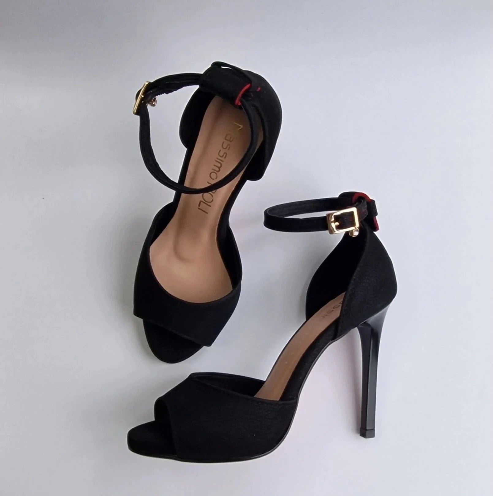 Red sole high heeled sandals in black