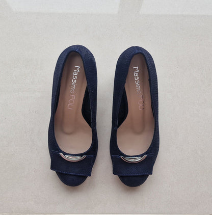 Navy leather round toe block heel court shoes.
