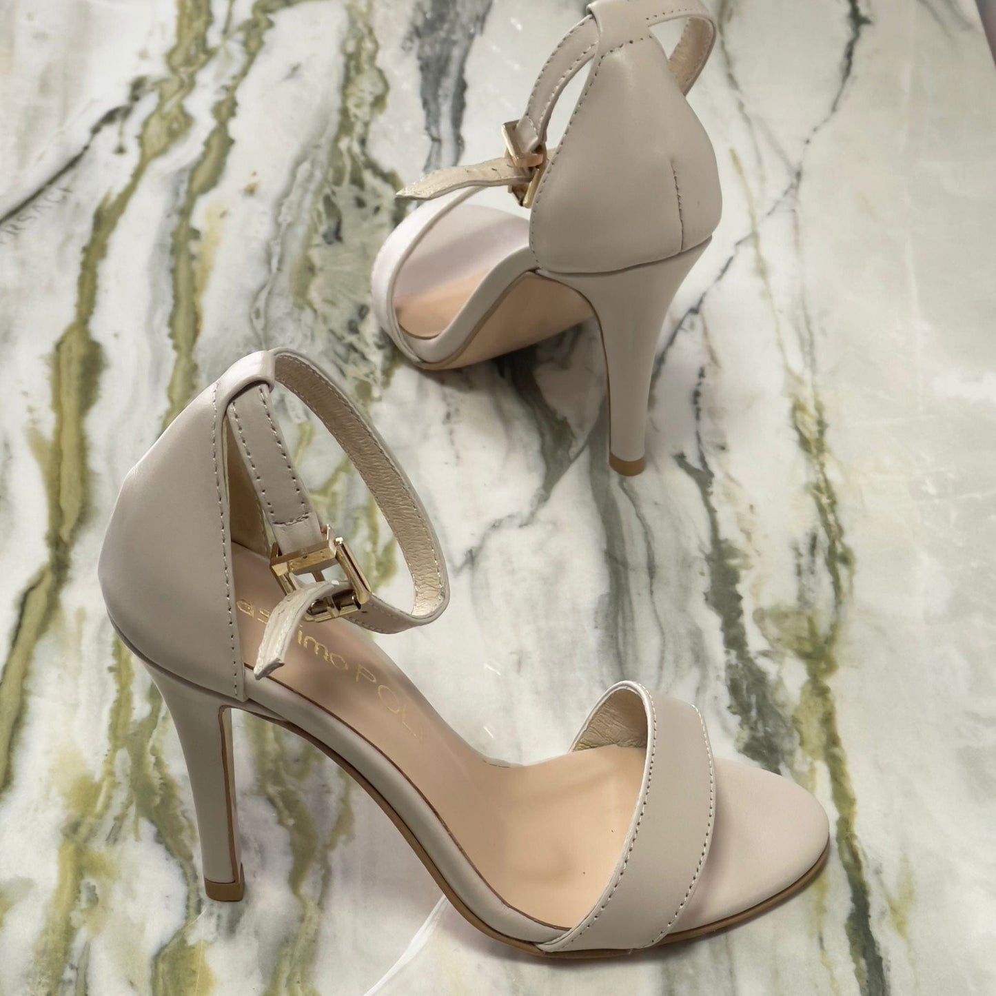 Small size ankle strap heeled sandals in nude leather