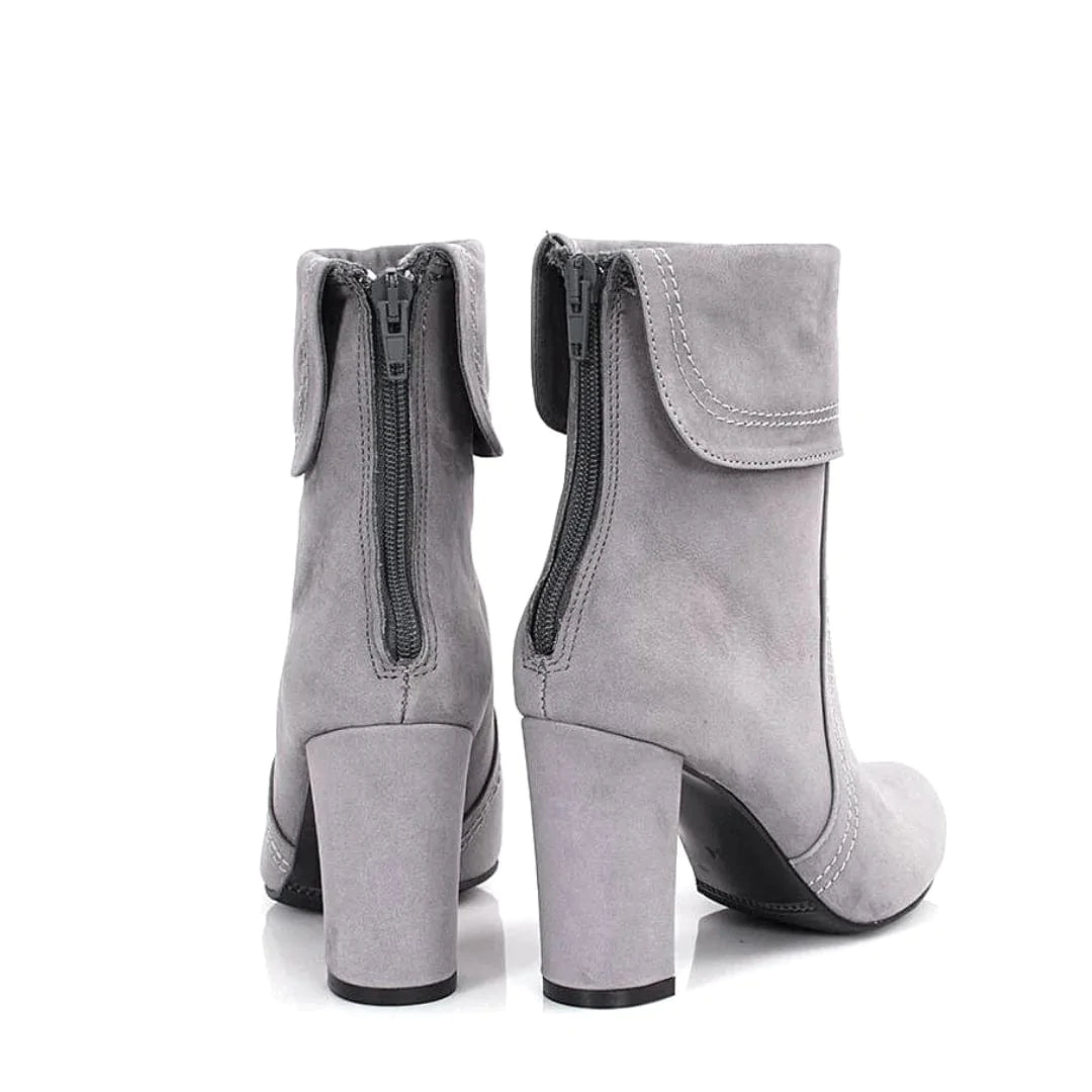 Mid heel ankle boots in grey suede with a zip