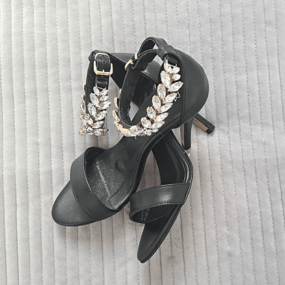 Black leather heels with diamanté ankle strap 