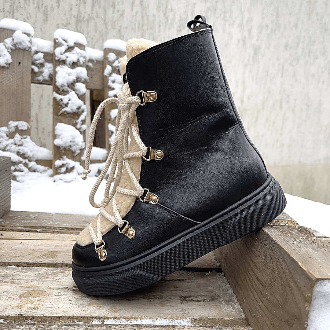 Tie up stomper boots in black leather