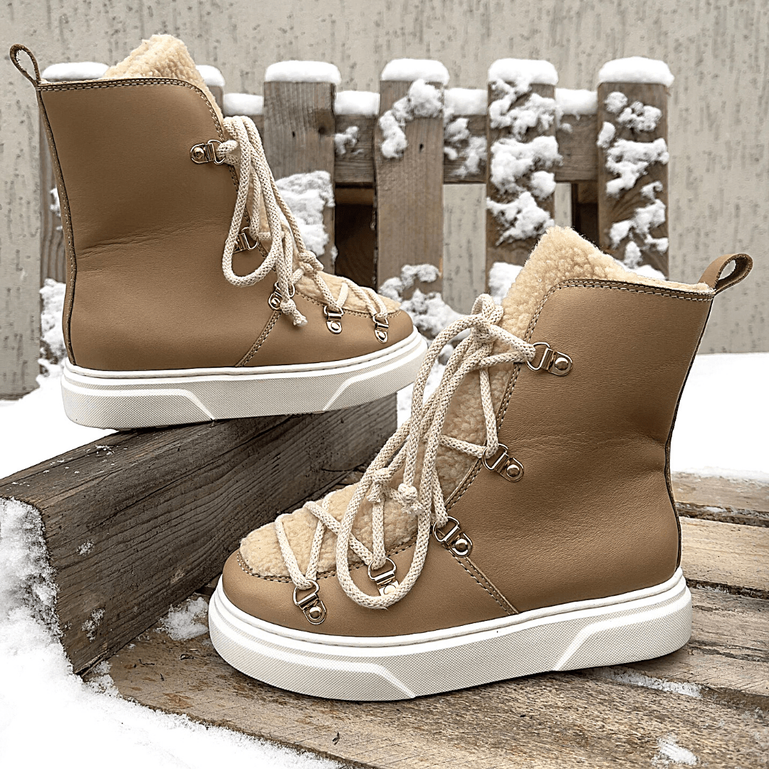 Lace up beige leather stomper boots
