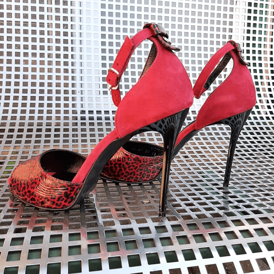 Red and 2024 black snakeskin heels
