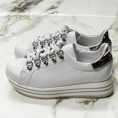 White and silver leather ladies sneaker shoes
