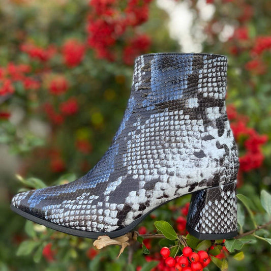 Pointed toe petite ankle boots in snake pattern