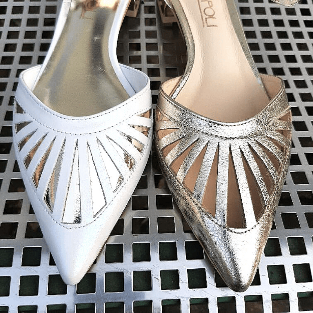 Pointed toe gold and white leather flat courts