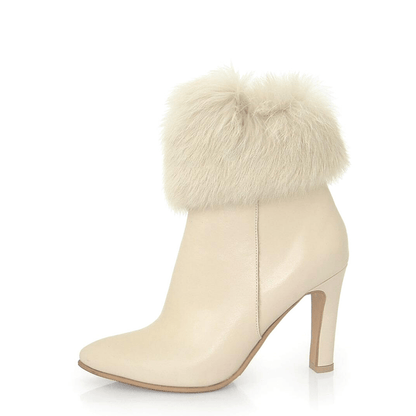 Mid heel ankle boots in cream leather with a fur trim